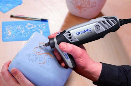   Dremel 3000. ³ 